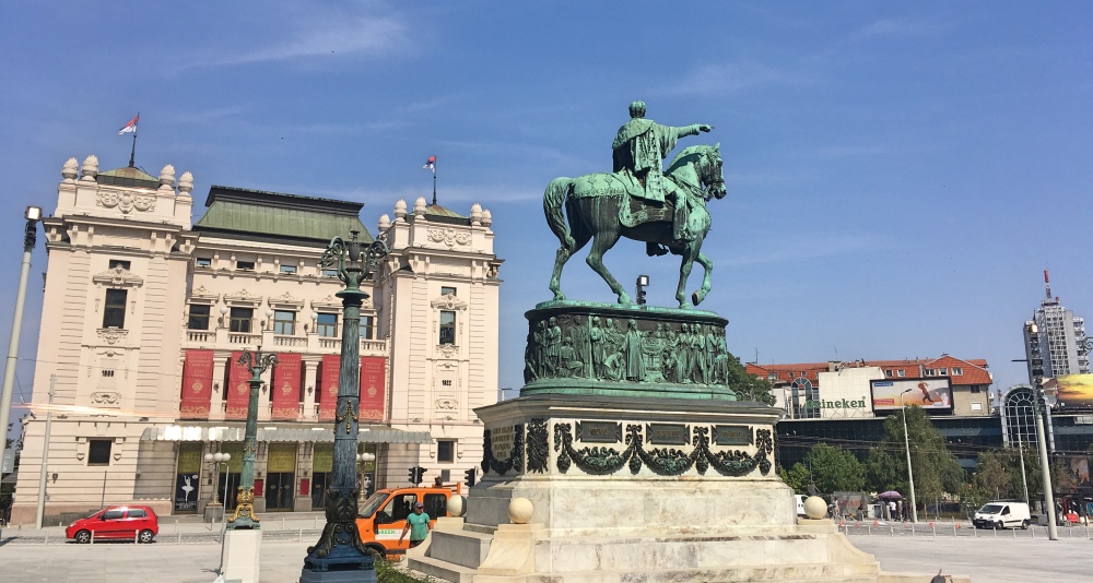 Monument to Knez Mihailo at Republic Square with the building of the National Theater