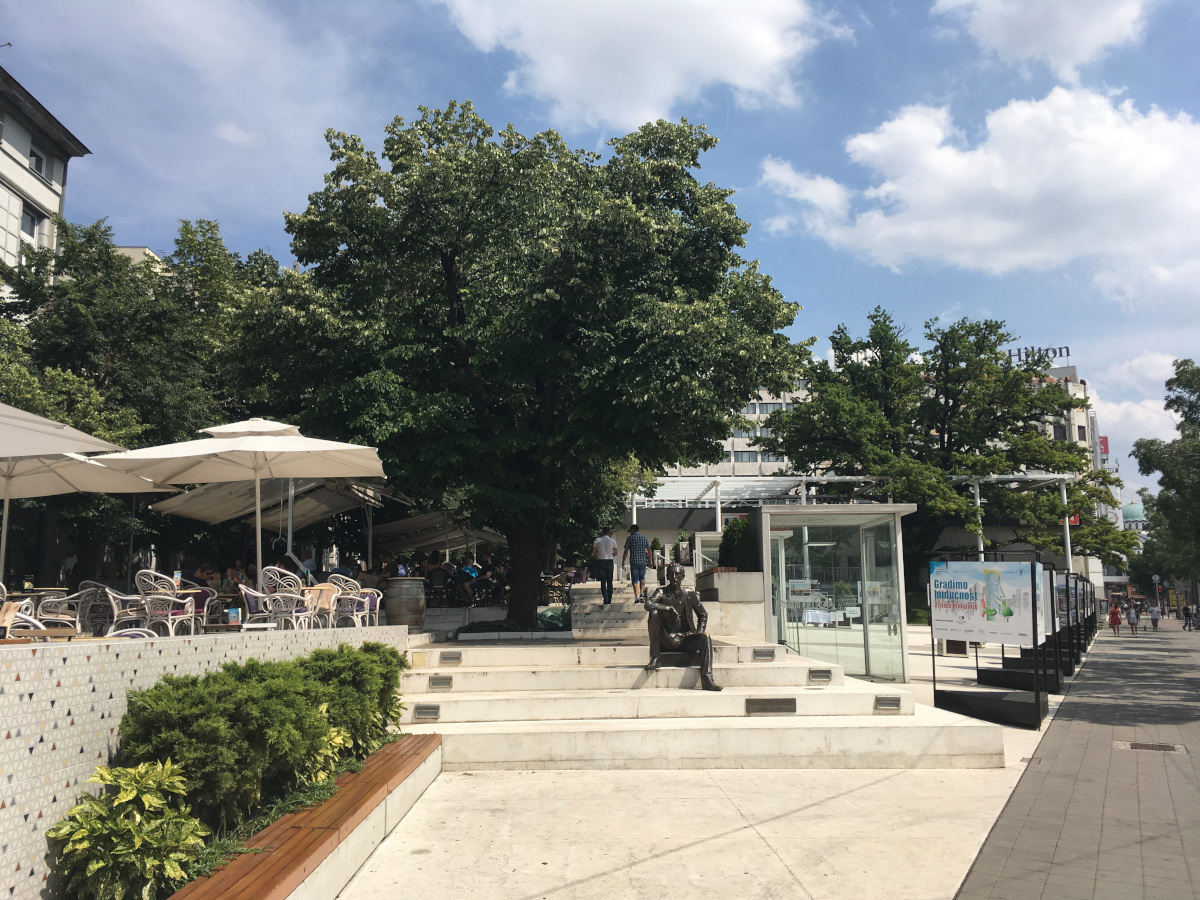 A view on Flower Square with monument to Borisla Pekić, writer